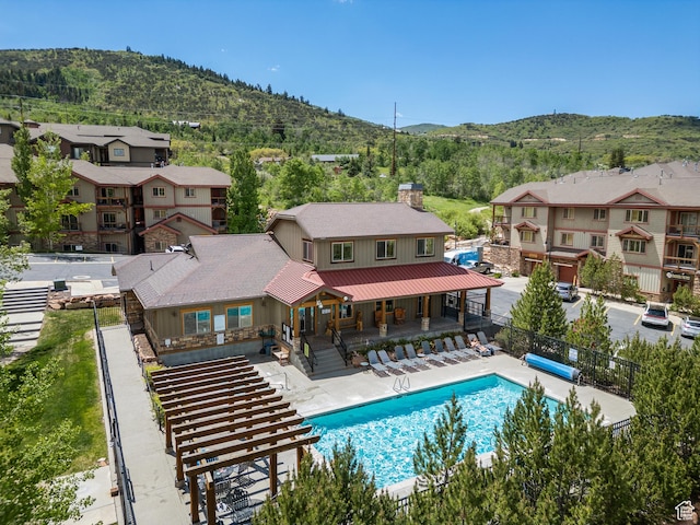 5430 N Cross Country Way, Park City, UT 84098 - community pool featuring a mountain view, a residential view, and a patio area