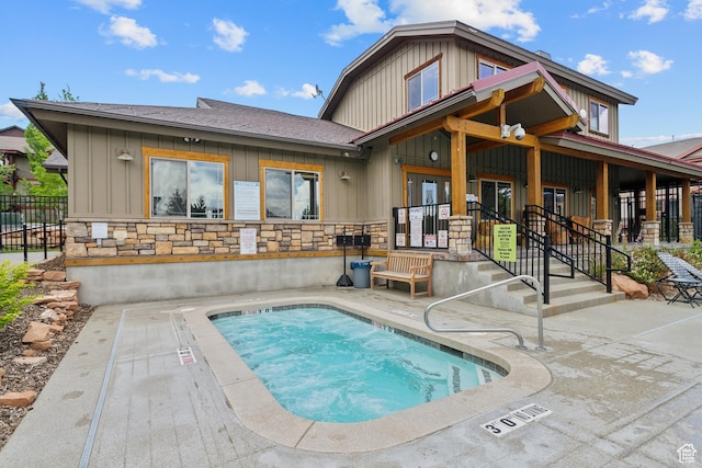 5430 N Cross Country Way, Park City, UT 84098 - back of house featuring board and batten siding, a patio area, a shingled roof, and stone siding
