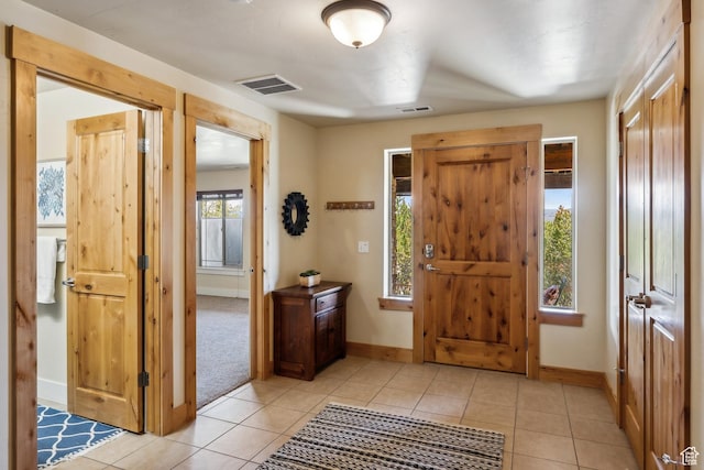 5430 N Cross Country Way, Park City, UT 84098 - entrance foyer featuring baseboards and light tile patterned floors