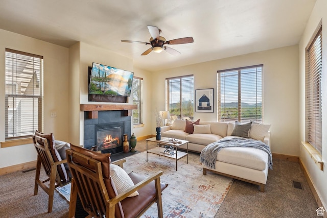 5430 N Cross Country Way, Park City, UT 84098 - living room featuring a fireplace, baseboards, a ceiling fan, and carpet