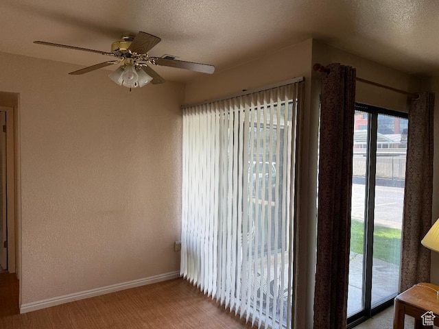 3975 S 805 E Unit G, Salt Lake City, UT 84107 - empty room with baseboards, ceiling fan, a textured wall, and a textured ceiling