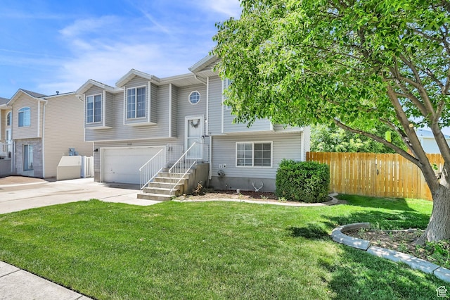 5443 S 4175 W, Roy, UT 84067 - bi-level home featuring driveway and an attached garage