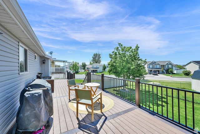 5443 S 4175 W, Roy, UT 84067 - wooden deck with a residential view, a yard, and area for grilling