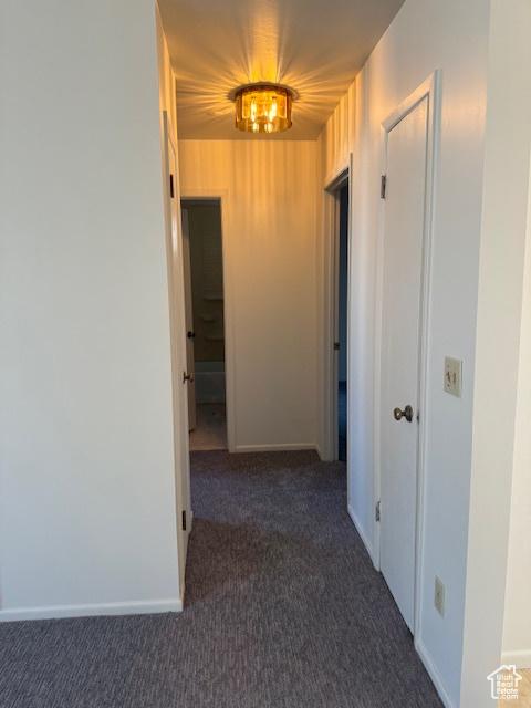 3165 S Green St, Salt Lake City, UT 84106 - corridor featuring carpet flooring and baseboards