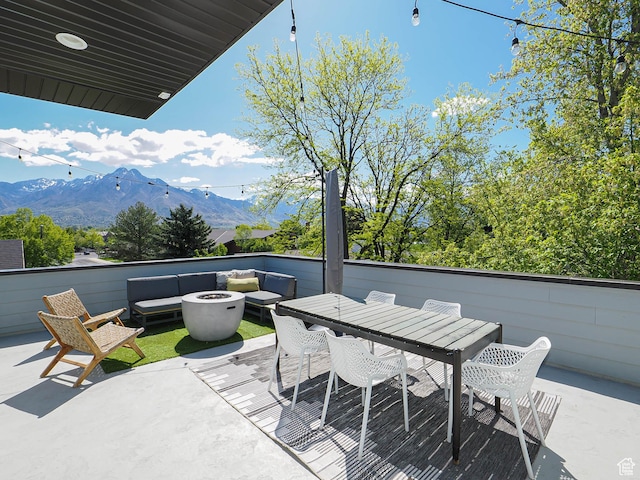 4535 S Bleecker Pl, Millcreek, UT 84117 - view of patio featuring a mountain view and an outdoor living space with a fire pit