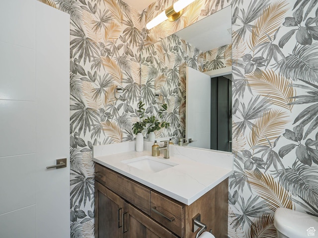 4535 S Bleecker Pl, Millcreek, UT 84117 - bathroom featuring wallpapered walls, vanity, and toilet