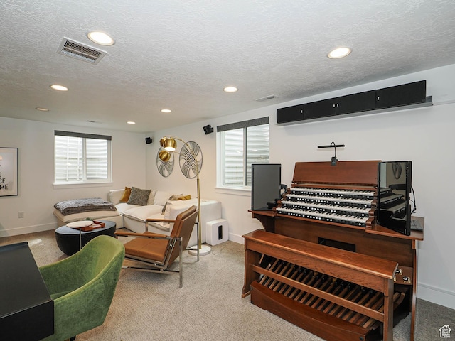 4535 S Bleecker Pl, Millcreek, UT 84117 - living room featuring carpet, recessed lighting, plenty of natural light, a textured ceiling, and baseboards