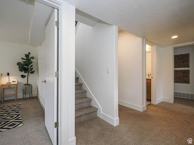 4535 S Bleecker Pl, Millcreek, UT 84117 - staircase with carpet flooring, baseboards, recessed lighting, and a textured ceiling