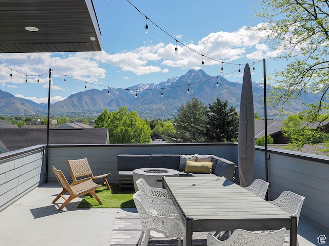 4535 S Bleecker Pl, Millcreek, UT 84117 - view of patio featuring an outdoor fire pit and a mountain view