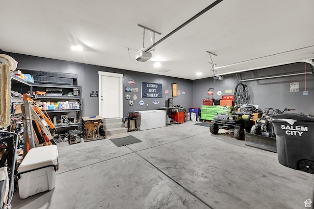 1279 S 50 E, Salem, UT 84653 - garage with a workshop area and a garage door opener