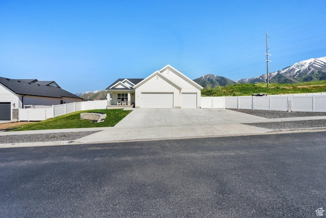 1279 S 50 E, Salem, UT 84653 - view of front of house featuring a mountain view, a garage, and driveway