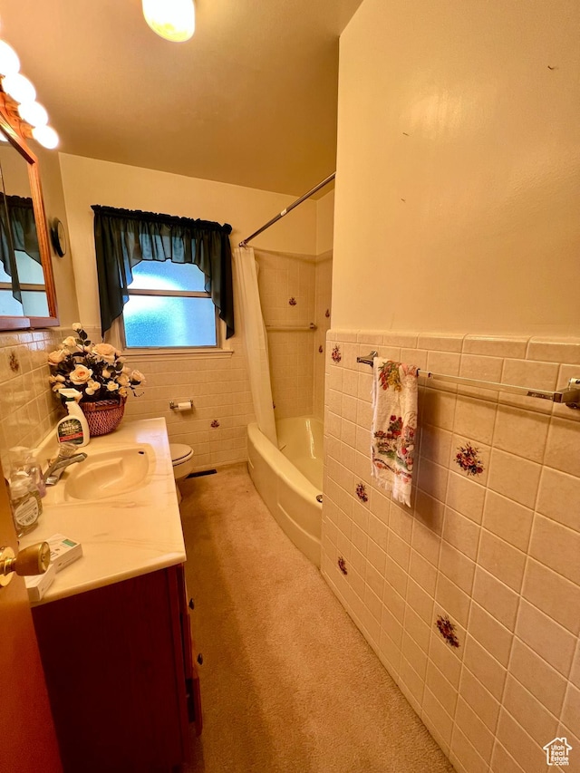 310 S 100 W, Monroe, UT 84754 - bathroom featuring tile walls, vanity, a wainscoted wall, toilet, and shower / bath combo with shower curtain