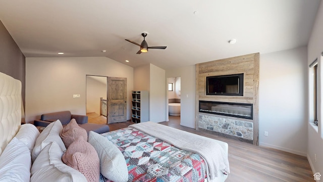 22677 E Snowbird Dr Unit 47, Spanish Fork, UT 84660 - bedroom featuring vaulted ceiling, wood finished floors, a fireplace, baseboards, and a ceiling fan