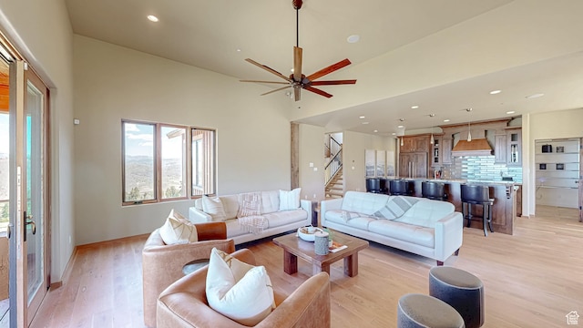 22677 E Snowbird Dr Unit 47, Spanish Fork, UT 84660 - living area featuring healthy amount of natural light, stairs, light wood-style floors, a ceiling fan, and recessed lighting