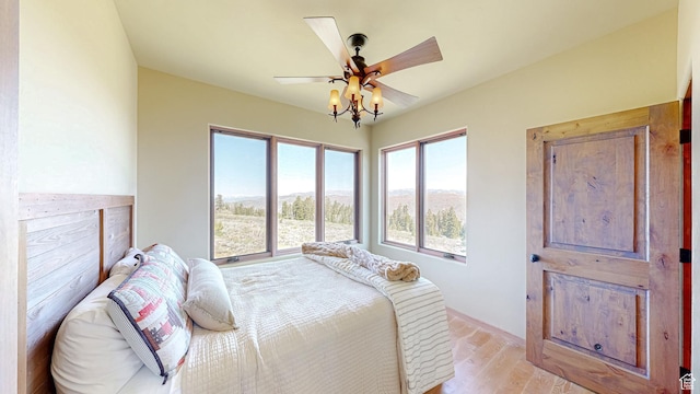 22677 E Snowbird Dr Unit 47, Spanish Fork, UT 84660 - bedroom with light wood-style floors and a ceiling fan