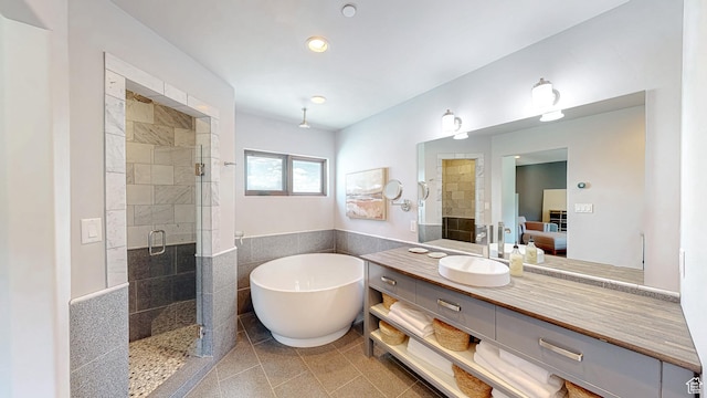 22677 E Snowbird Dr Unit 47, Spanish Fork, UT 84660 - bathroom featuring connected bathroom, a shower stall, a freestanding bath, vanity, and recessed lighting