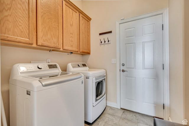 1804 E Longbranch Ct, Draper Ut Cnty, UT 84020 - laundry room with washer and dryer, cabinet space, and light marble finish floors