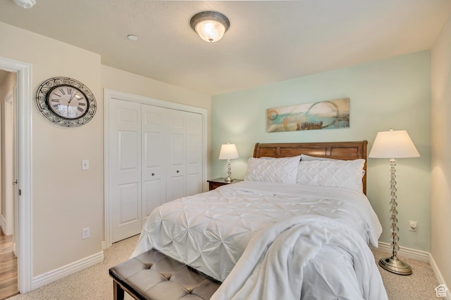 1804 E Longbranch Ct, Draper Ut Cnty, UT 84020 - bedroom featuring a closet, baseboards, and carpet