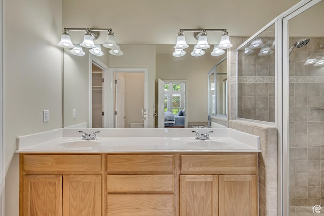 1804 E Longbranch Ct, Draper Ut Cnty, UT 84020 - ensuite bathroom with a shower stall, double vanity, and toilet