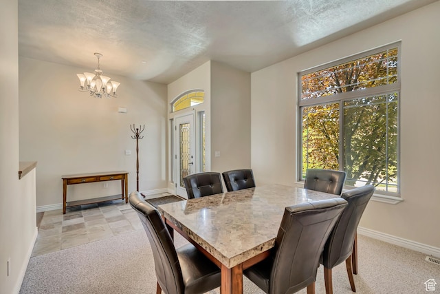 1804 E Longbranch Ct, Draper Ut Cnty, UT 84020 - dining room featuring a chandelier, baseboards, light carpet, and a textured ceiling