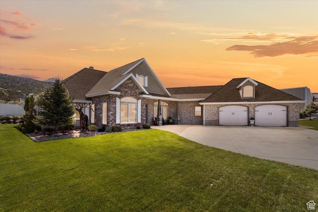 1079 S 400 E, Nephi, UT 84648 - view of front of property with a front lawn, driveway, a garage, and roof with shingles