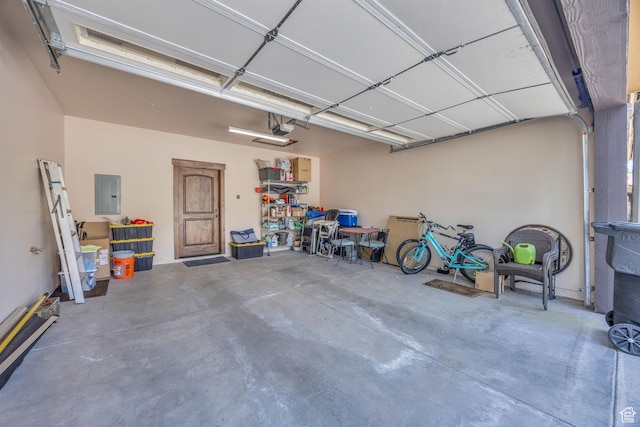 1009 W White Cloud Trl, Kamas, UT 84036 - garage featuring electric panel and a garage door opener