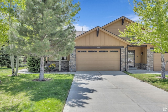 1009 W White Cloud Trl, Kamas, UT 84036 - craftsman-style house featuring stone siding, a garage, board and batten siding, a front yard, and driveway