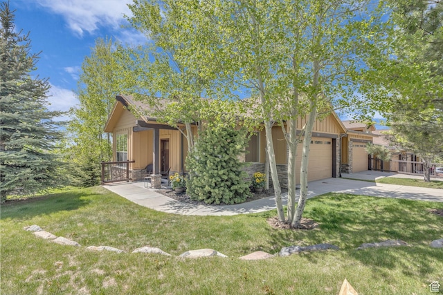 1009 W White Cloud Trl, Kamas, UT 84036 - view of front facade featuring stone siding, a garage, driveway, and board and batten siding