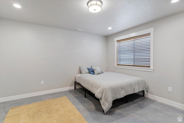 1243 Kotter Dr, Brigham City, UT 84302 - bedroom with concrete floors, recessed lighting, and baseboards