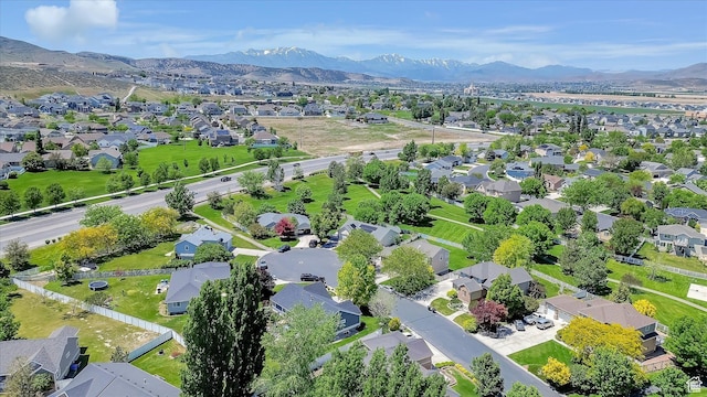 42 E Frontier Ct, Saratoga Springs, UT 84045 - aerial perspective of suburban area featuring a mountainous background
