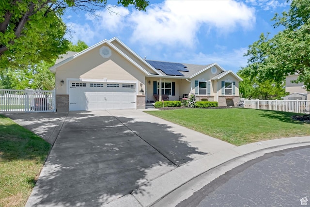 42 E Frontier Ct, Saratoga Springs, UT 84045 - single story home featuring covered porch, brick siding, roof mounted solar panels, driveway, and an attached garage