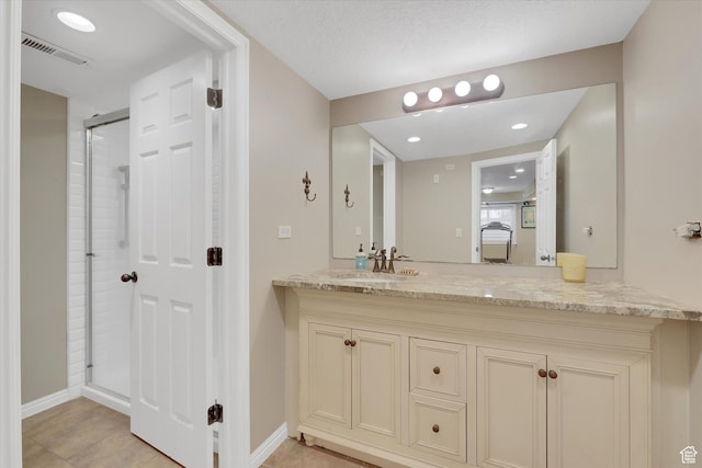 42 E Frontier Ct, Saratoga Springs, UT 84045 - full bath with vanity, baseboards, a shower with shower door, and recessed lighting