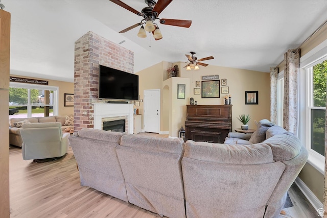 42 E Frontier Ct, Saratoga Springs, UT 84045 - living area with lofted ceiling, ceiling fan, light wood-style floors, and plenty of natural light