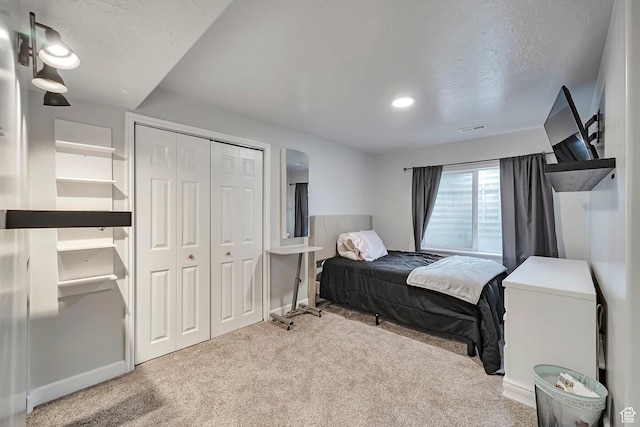 267 W Noah Cir S, Murray, UT 84107 - carpeted bedroom with a closet, a textured ceiling, and baseboards