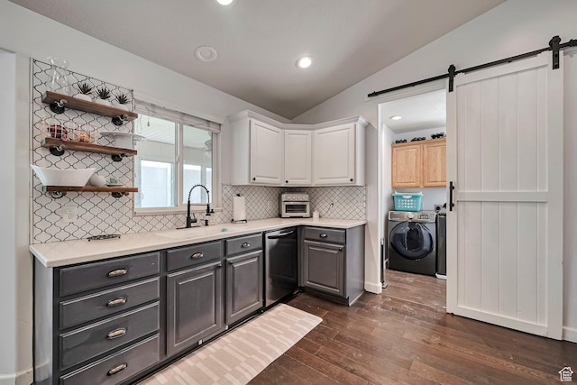 267 W Noah Cir S, Murray, UT 84107 - kitchen with a sink, independent washer and dryer, dishwasher, a barn door, and lofted ceiling