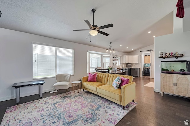 267 W Noah Cir S, Murray, UT 84107 - living room with washer / dryer, a barn door, a ceiling fan, dark wood-style flooring, and vaulted ceiling