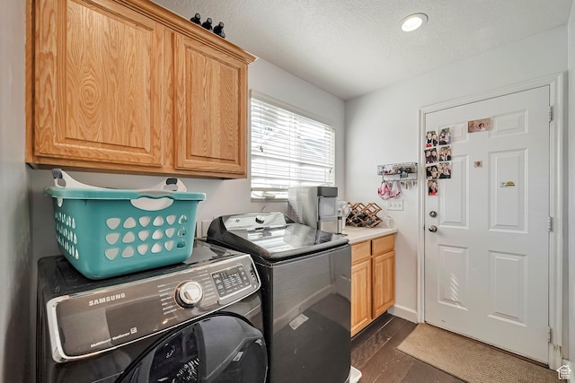 267 W Noah Cir S, Murray, UT 84107 - laundry area featuring cabinet space, washing machine and dryer, a textured ceiling, and dark wood-type flooring