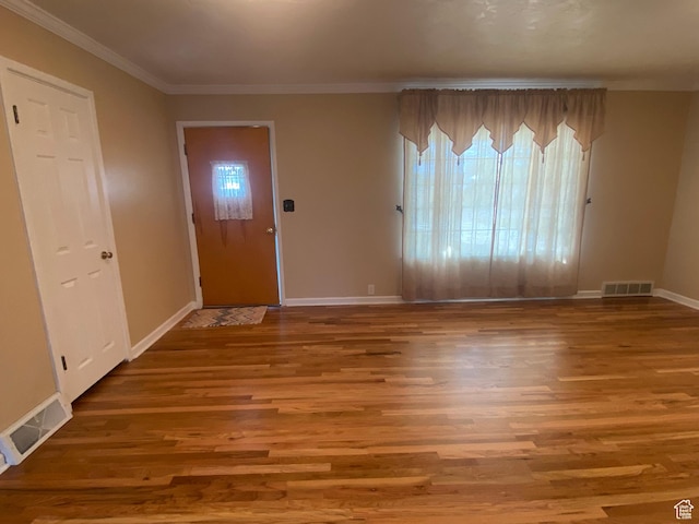 225 S 200 E, Price, UT 84501 - entryway with wood finished floors, baseboards, and crown molding