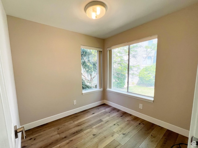 543 S 900 E Unit C3, Salt Lake City, UT 84102 - unfurnished room with light wood-type flooring, plenty of natural light, and baseboards