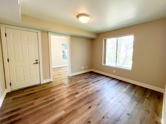 543 S 900 E Unit C3, Salt Lake City, UT 84102 - empty room featuring baseboards and wood finished floors