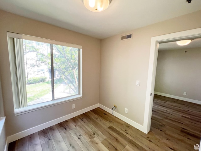 543 S 900 E Unit C3, Salt Lake City, UT 84102 - spare room featuring wood finished floors and baseboards