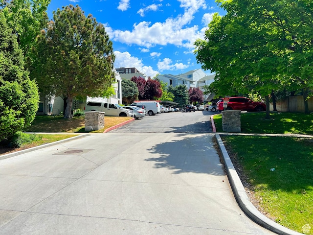 543 S 900 E Unit C3, Salt Lake City, UT 84102 - view of concrete road with curbs and a residential view