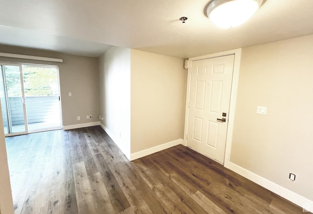 543 S 900 E Unit C3, Salt Lake City, UT 84102 - spare room with dark wood-type flooring, baseboards, and a pendent fire sprinkler