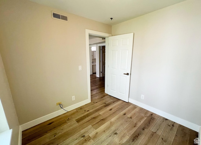 543 S 900 E Unit C3, Salt Lake City, UT 84102 - spare room featuring wood finished floors and baseboards