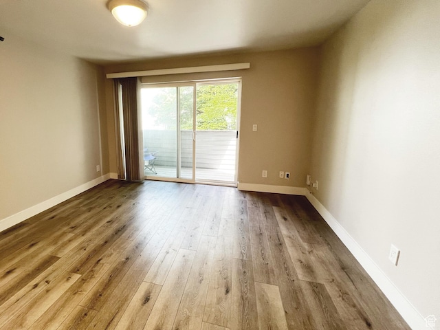 543 S 900 E Unit C3, Salt Lake City, UT 84102 - spare room featuring wood finished floors and baseboards