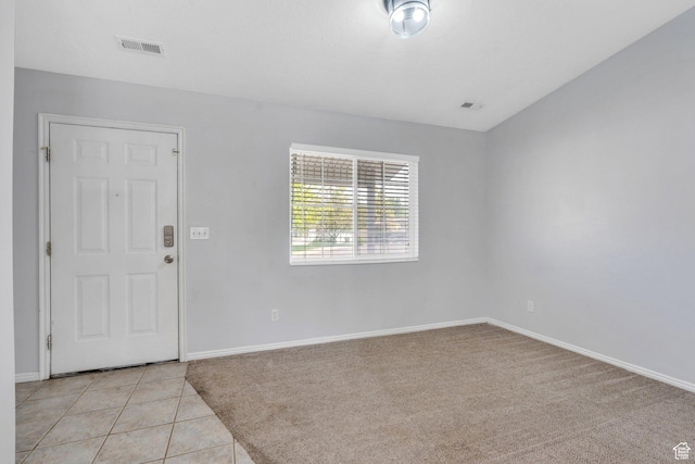 2033 W 410 S, Provo, UT 84601 - foyer with baseboards, light tile patterned floors, and light colored carpet