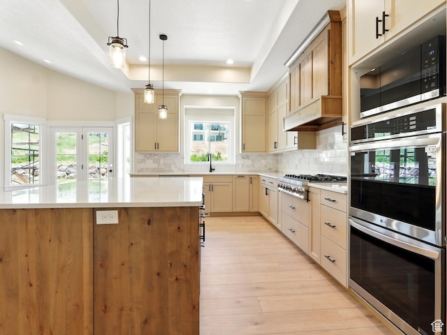 2023 S 150 W, Perry, UT 84302 - kitchen featuring appliances with stainless steel finishes, light countertops, backsplash, light wood finished floors, and recessed lighting