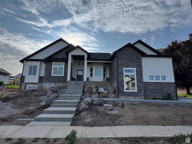 2023 S 150 W, Perry, UT 84302 - craftsman-style house with stone siding and board and batten siding