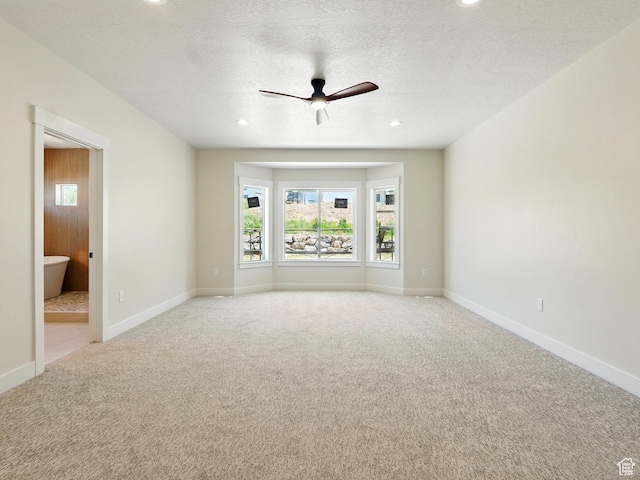 2023 S 150 W, Perry, UT 84302 - spare room with light colored carpet, baseboards, a ceiling fan, recessed lighting, and a textured ceiling