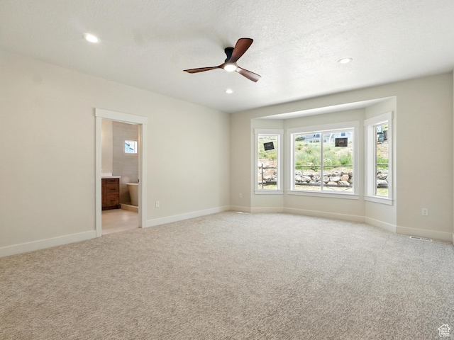 2023 S 150 W, Perry, UT 84302 - spare room featuring ceiling fan, light colored carpet, baseboards, recessed lighting, and a textured ceiling